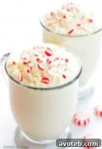 Peppermint White Hot Chocolate in a mug with whipped cream