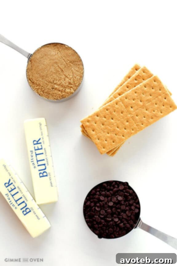 The five simple ingredients for Graham Cracker Toffee laid out on a table