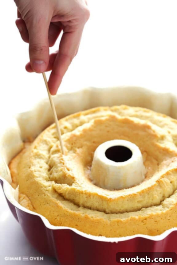Handcrafted Rum Cake 6 Golden-brown rum cake fresh out of the bundt pan, cooling on a rack