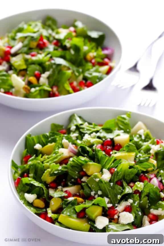 Pomegranate Pear Avocado Salad -- fresh, flavorful, and simply delicious! | gimmesomeoven.com