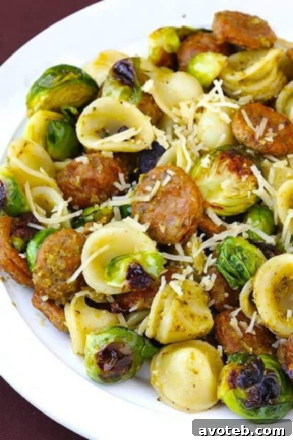 Pesto Pasta with Chicken Sausage and Roasted Brussels Sprouts | gimmesomeoven.com