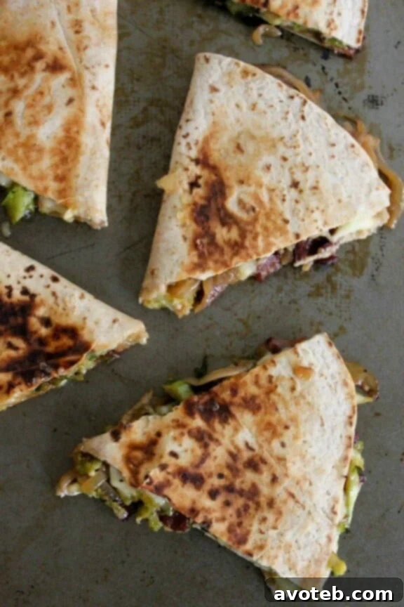 Brie Quesadillas with Brussels Sprouts, Bacon and Beer-Glazed Onions | domesticate-me.com