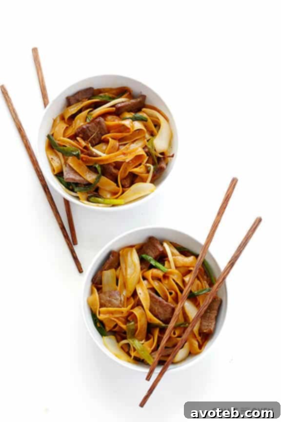 Beef Chow Fun Stir Fry 8 Serving of Beef Chow Fun with fresh scallions