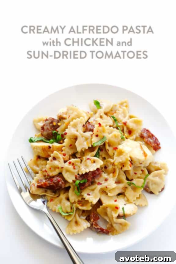 Creamy Pasta with Chicken & Sun-Dried Tomatoes -- a wholesome and quick meal ready in 30 minutes, featuring a lightened-up, rich sauce. Discover this delightful recipe at avoteb.com