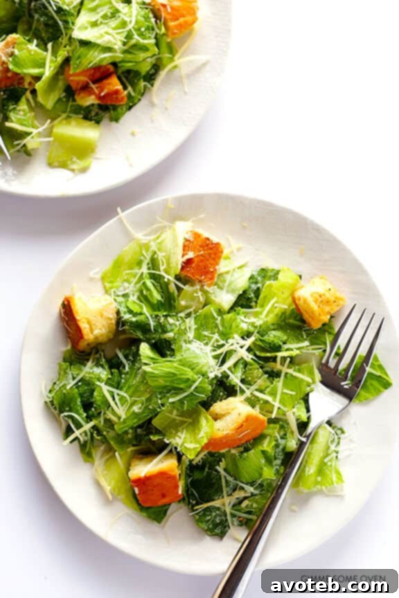 Guilt-Free Caesar Greens 8 Tossing Lighter Caesar Salad with dressing and cheese
