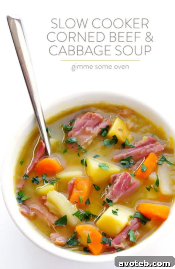 Hearty Corned Beef and Cabbage Stew 6 Pot of Corned Beef and Cabbage Soup simmering on the stovetop