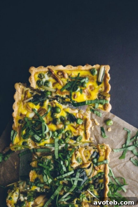 Loaded Vegetable Spring Quiche, bursting with fresh vegetables.