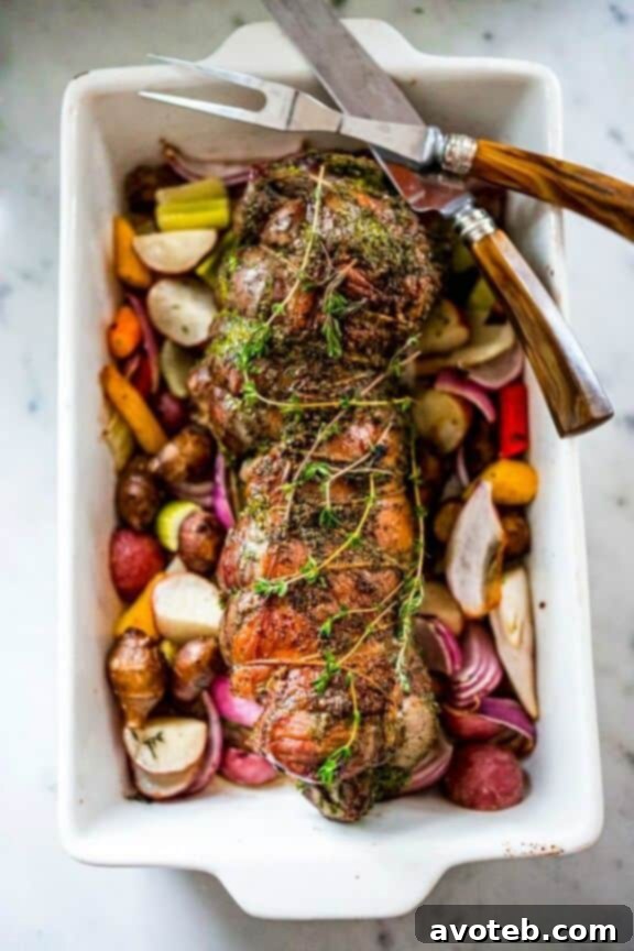 Herb Crusted Leg of Lamb with vibrant Mint Gremolata.