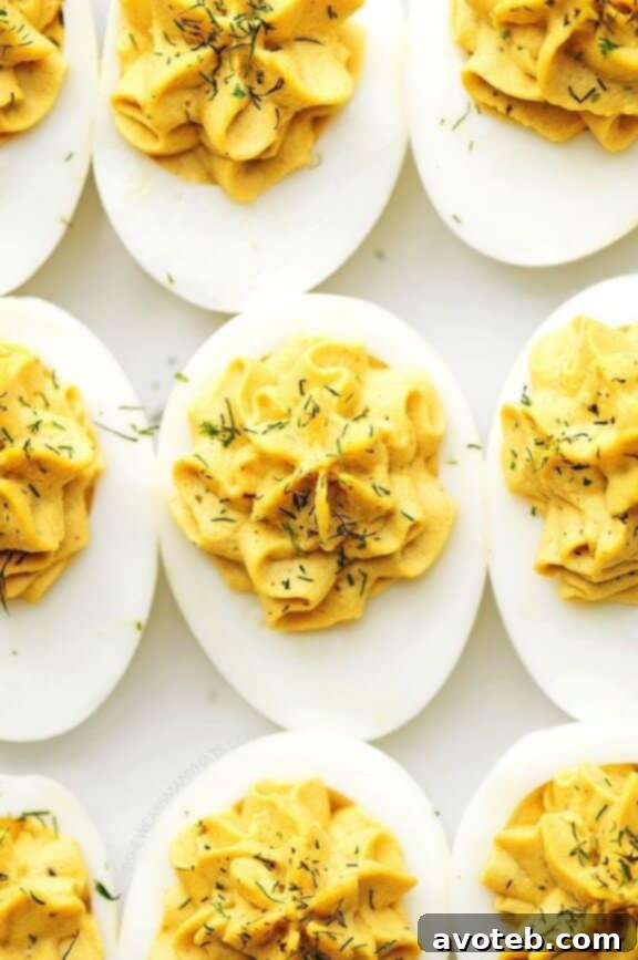Perfect Deviled Eggs, creamy and sprinkled with paprika.