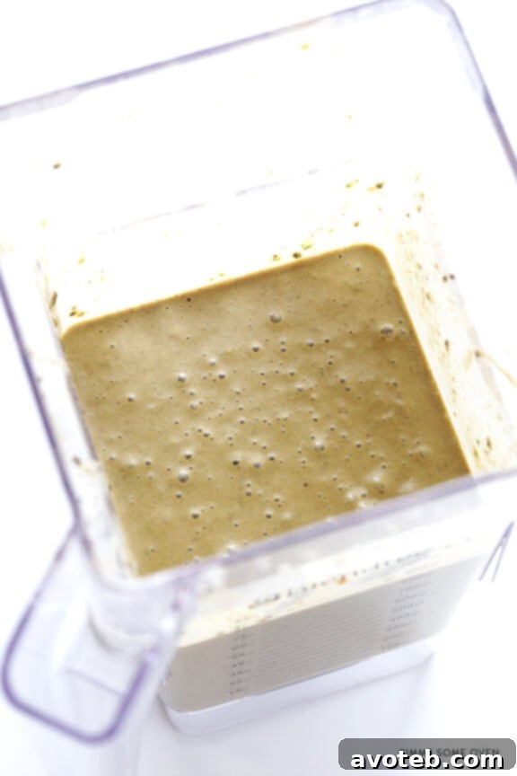 Chocolate Peanut Butter Green Goddess Smoothie 5 Adding ingredients to a blender for a Chocolate Peanut Butter Green Smoothie
