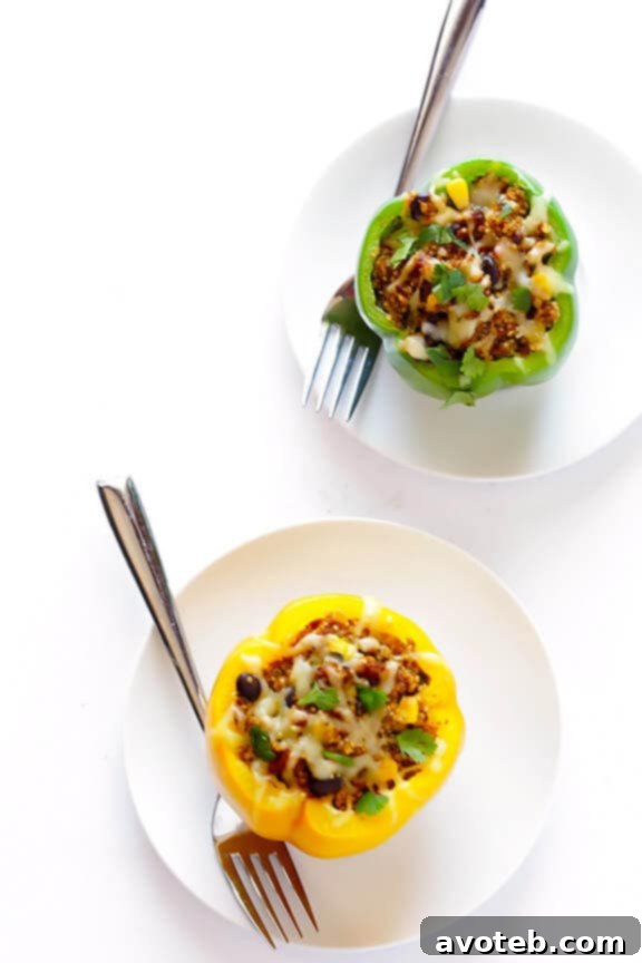 LOVE this 5-Ingredient Vegetarian Stuffed Peppers recipe! It's easy, cheesy, filled with lots of quinoa and black beans, and SO delicious! | gimmesomeoven.com 