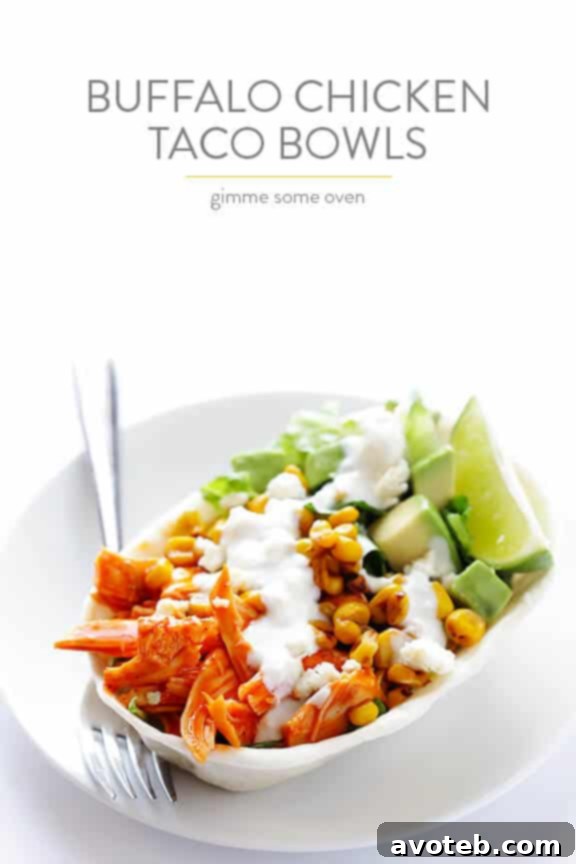 A vibrant spread of Buffalo Chicken Tacos with various toppings, ready to be enjoyed.
