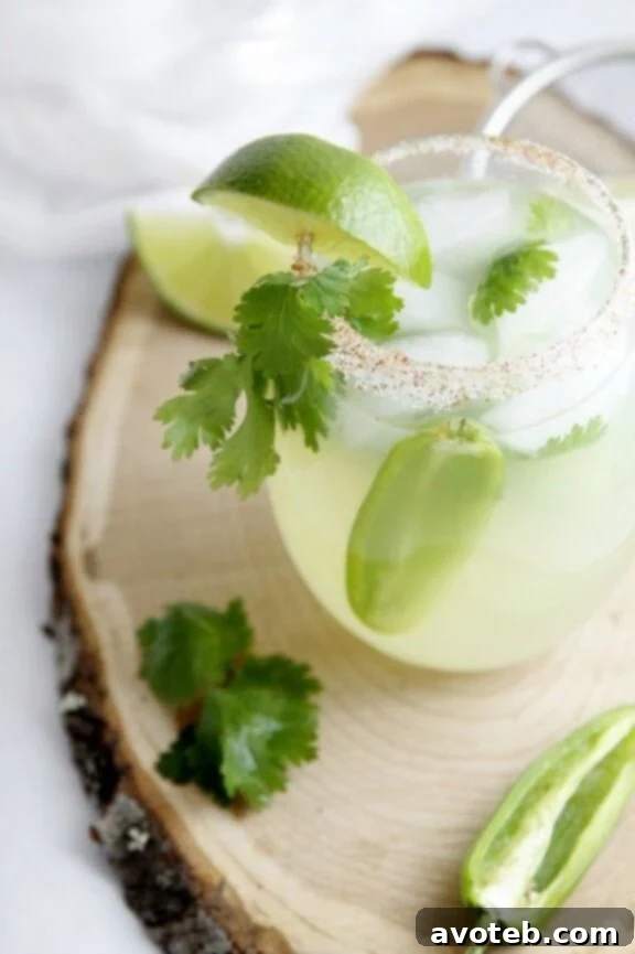 15 Must Try Margarita Creations 8 A vibrant cilantro jalapeno margarita, showcasing a spicy kick and herbaceous freshness.