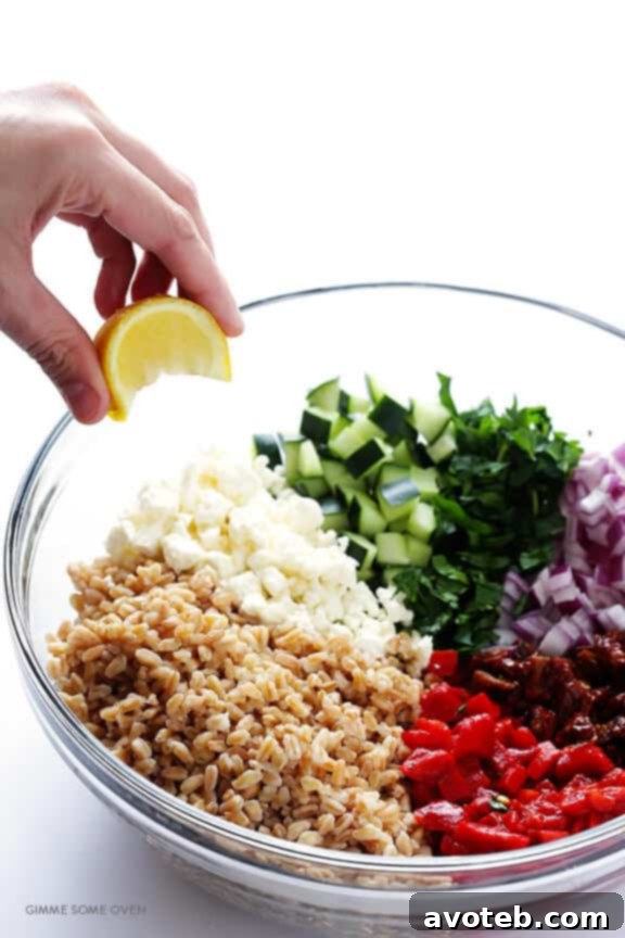 Serving suggestion for Mediterranean Farro Salad, showing its colorful ingredients.