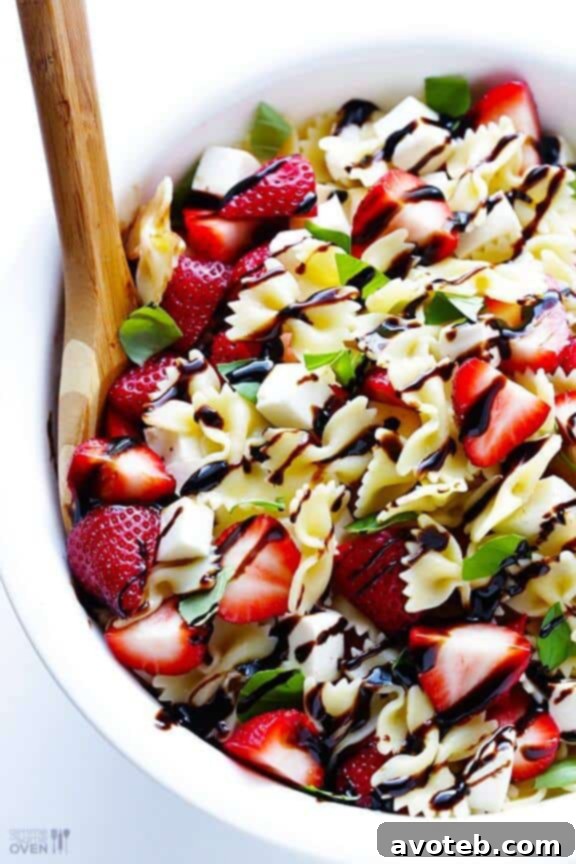 15 Irresistible Strawberry Delights 16 5-Ingredient Strawberry Caprese Pasta Salad, a light and flavorful side dish.