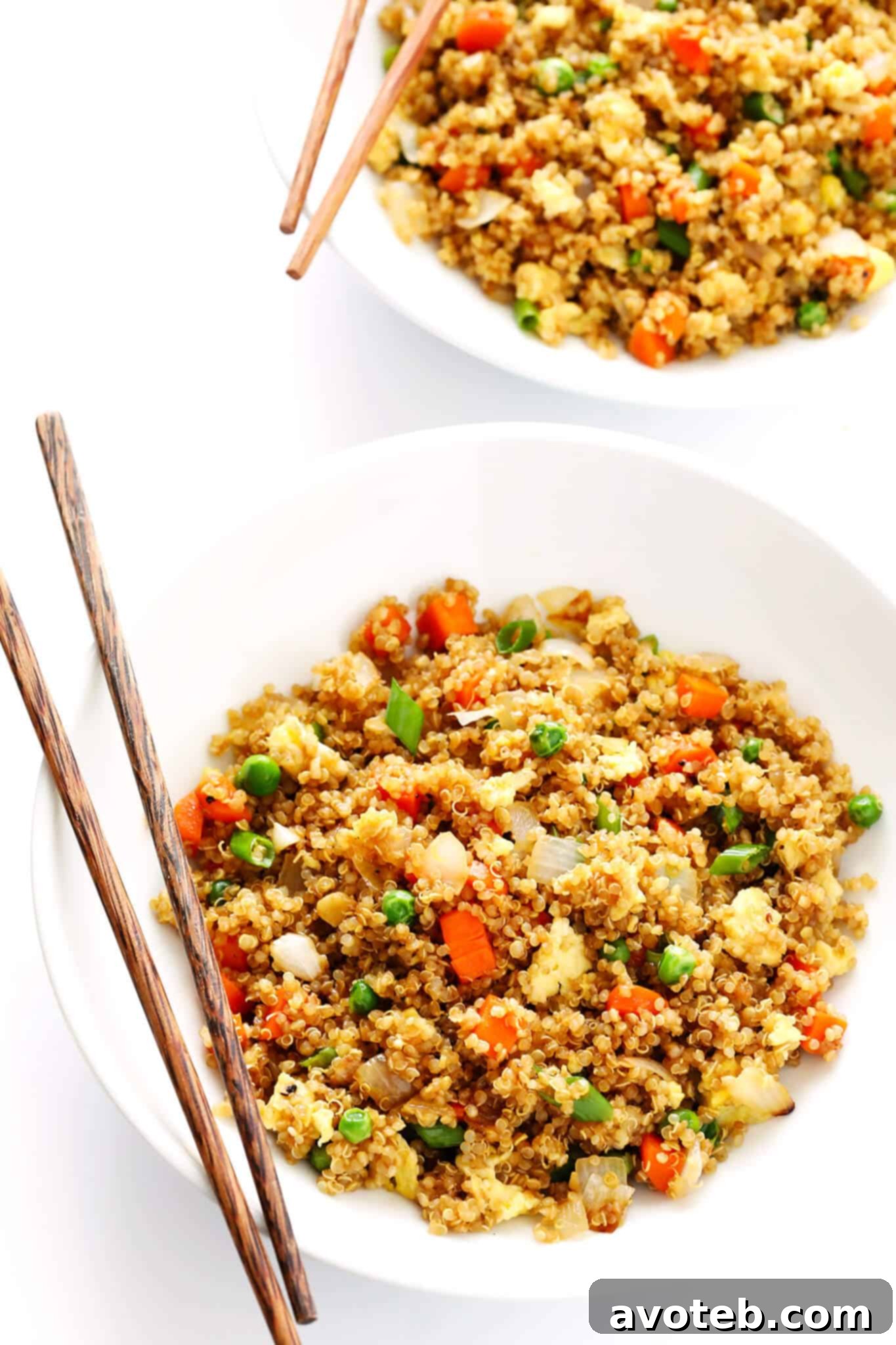 Close-up of a skillet filled with freshly made Quinoa Fried Rice
