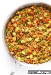 Quinoa Fried 'Rice' in a bowl, garnished with green onions.