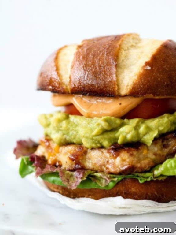 Bacon Cheddar Chicken Burgers with Guacamole and BBQ Mayo | foodiecrush.com