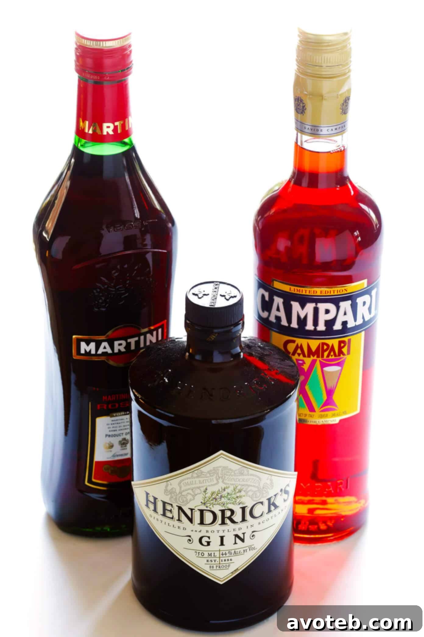 Three simple yet powerful ingredients: Campari, gin, and sweet vermouth come together to create the iconic Negroni cocktail, a symphony of bitter, sweet, and botanical notes. Essential ingredients for a Classic Negroni: a bottle of Campari, a bottle of gin, and a bottle of sweet red vermouth