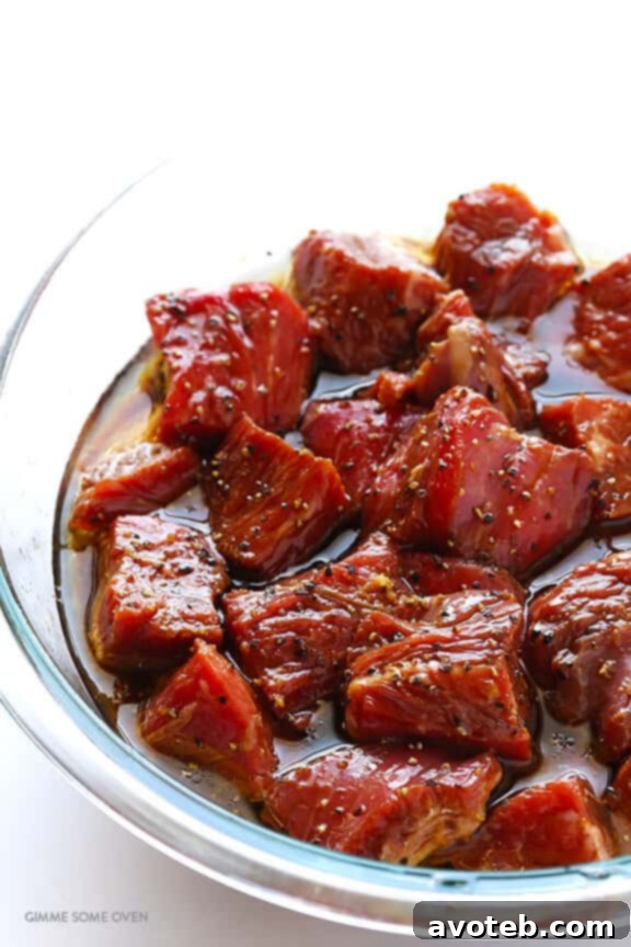 Asian Pepper Steak Kabobs Marinating: A close-up of steak and vegetables ready for grilling