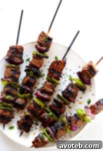 Asian Pepper Steak Kabobs on a white plate