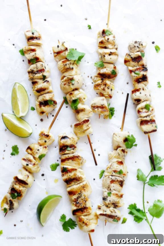 Tequila Lime Chicken Kabobs served on a platter with lime wedges