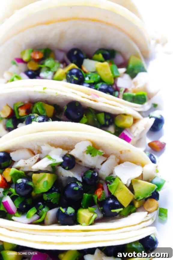 Multiple Fish Tacos with Blueberry-Almond Salsa on a plate