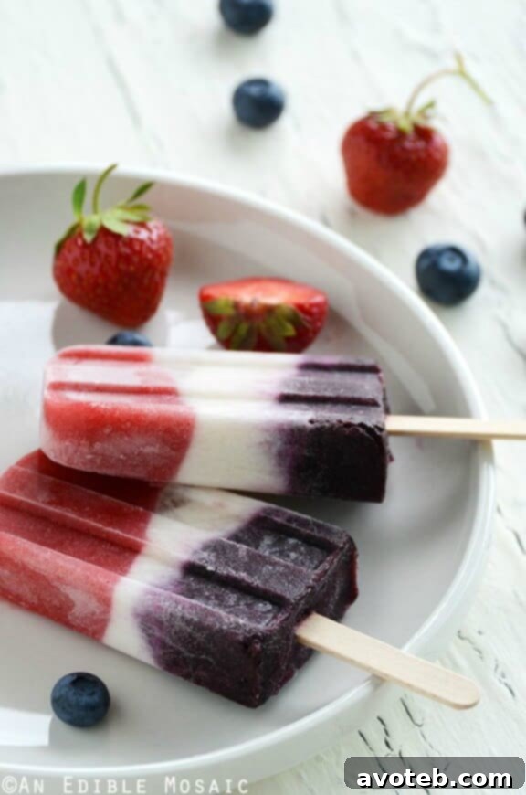 15 Naturally Vibrant Red, White, and Blue Recipes 16 Red, White and Blue Double Berry Coconut Pops | anediblemosaic.com