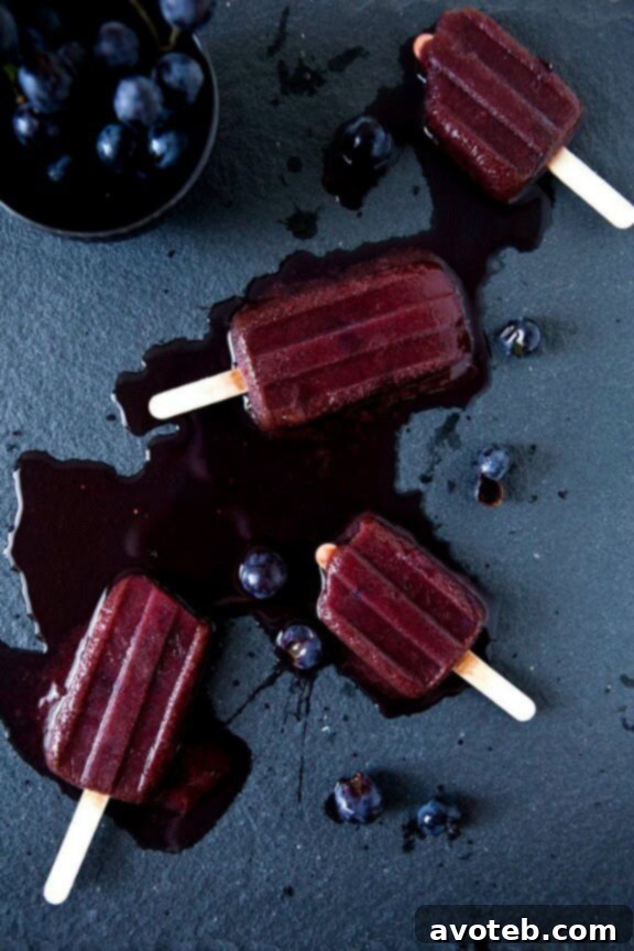 Concord Grape & Lemon Zest Popsicles for a vibrant and tangy treat
