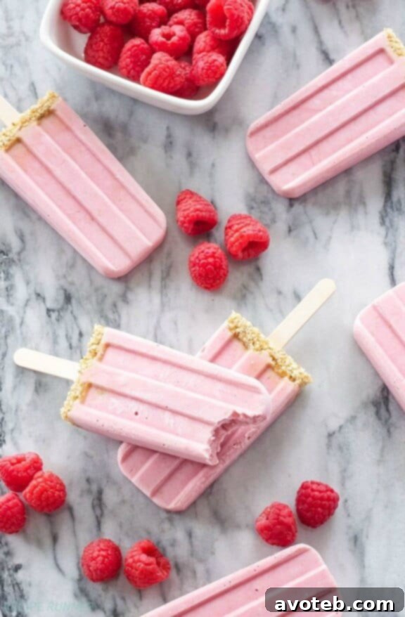 Raspberry Cheesecake Yogurt Popsicles for a creamy and fruity dessert