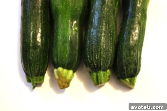 Close-up of a freshly baked Blueberry Zucchini Bread loaf with a beautiful golden crust