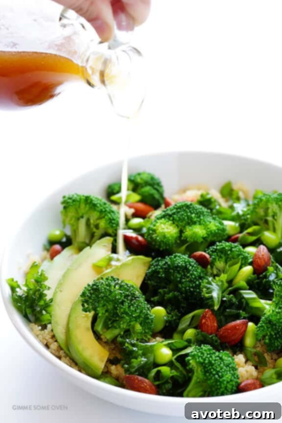 Close-up of Blue Diamond Sriracha Almonds nestled among the fresh ingredients of the Easy Superfood Quinoa Bowl.