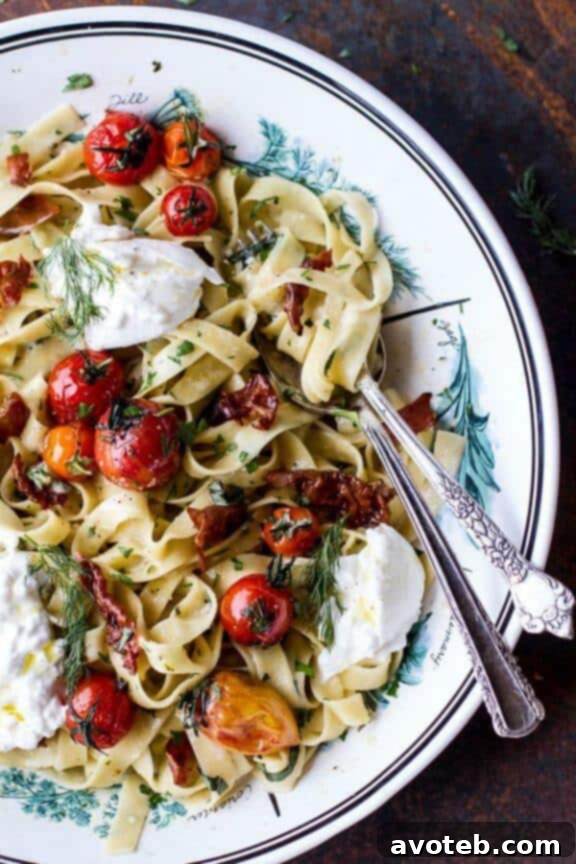 Garlic and Herb Roasted Cherry Tomato Carbonara with Crispy Prosciutto and Burrata, a rich and incredibly flavorful pasta dish.