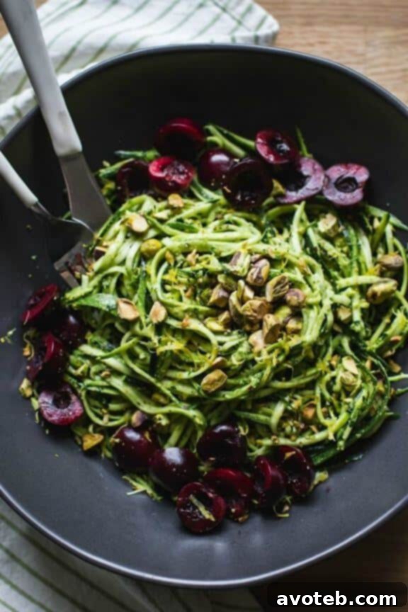 Pistachio Kale Pesto with Zucchini Noodles + Cherries | edibleperspective.com