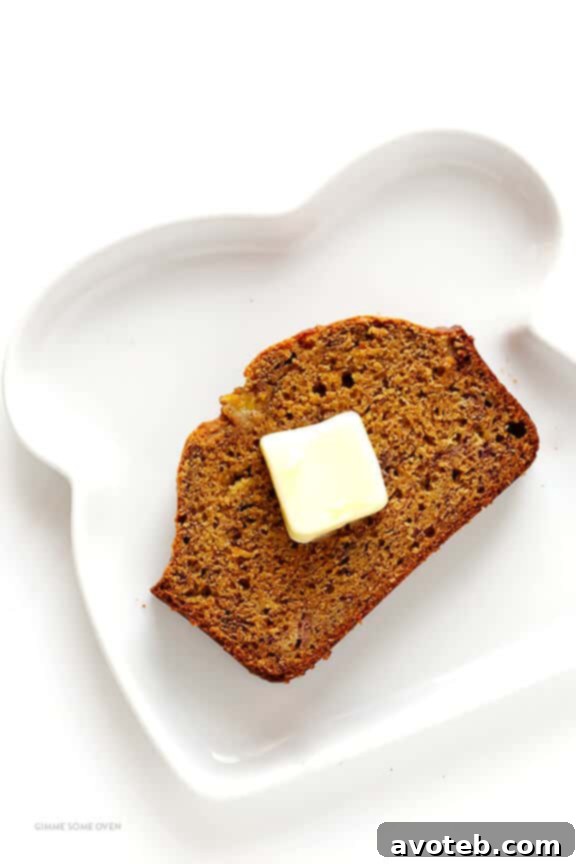 Another beautiful shot of a slice of banana bread, ready to be enjoyed.