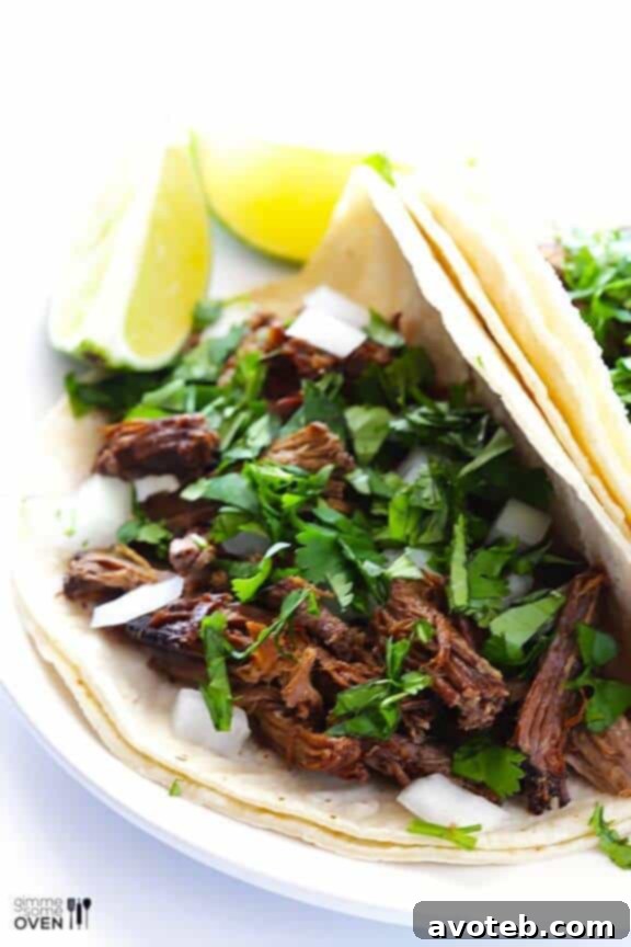 15 Creative Taco Recipes 6 Slow Cooker Barbacoa Recipe | Tender and flavorful shredded beef for tacos from Gimme Some Oven.