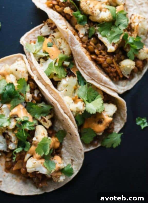 15 Creative Taco Recipes 7 Roasted Cauliflower and Lentil Tacos with Creamy Chipotle Sauce | A hearty and delicious vegetarian taco option from Cookie and Kate.