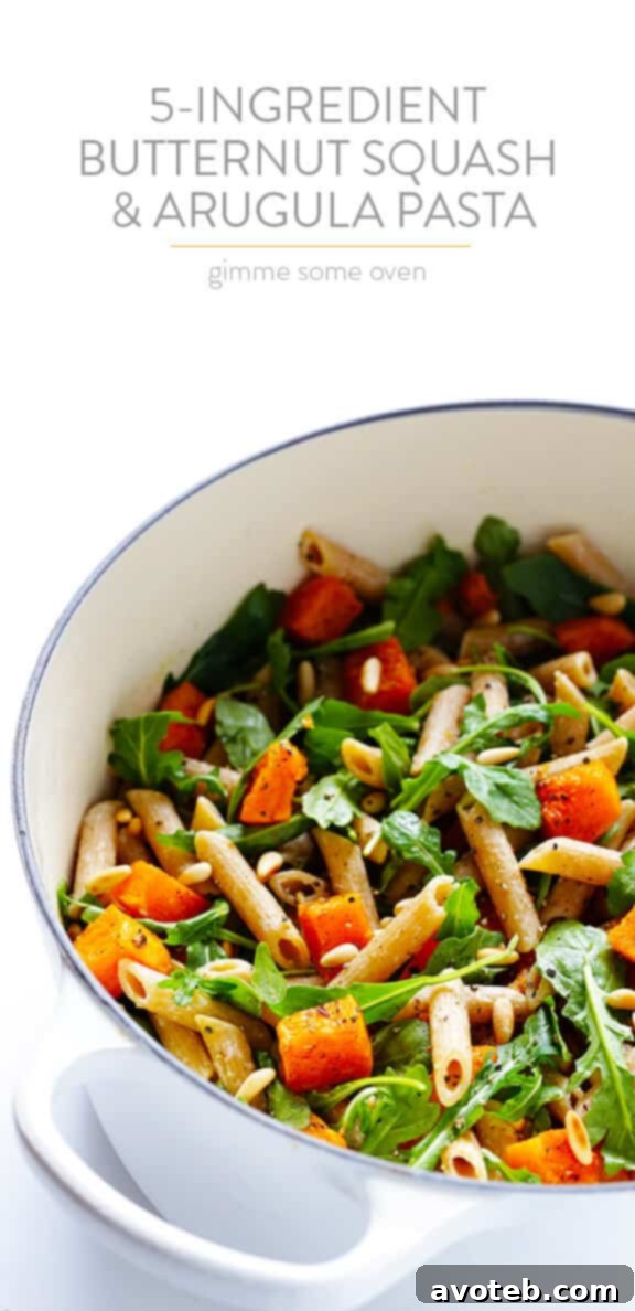 5-Ingredient Butternut Squash Pasta with Arugula and Goat Cheese 12 A large serving bowl filled with the colorful 5-Ingredient Butternut Squash, Arugula, and Goat Cheese Pasta, ready for sharing