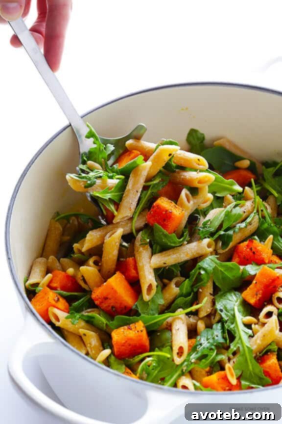 5-Ingredient Butternut Squash Pasta with Arugula and Goat Cheese 8 Full view of the prepared Butternut Squash, Arugula, and Goat Cheese Pasta in a serving bowl, garnished with pepper