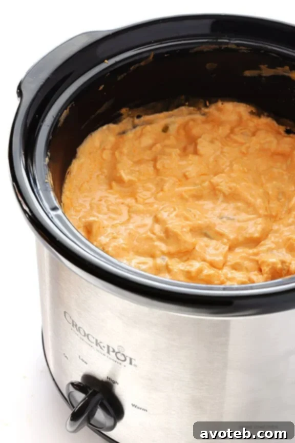 Ultimate Buffalo Chicken Appetizer 5 Stirring the buffalo chicken dip ingredients together.