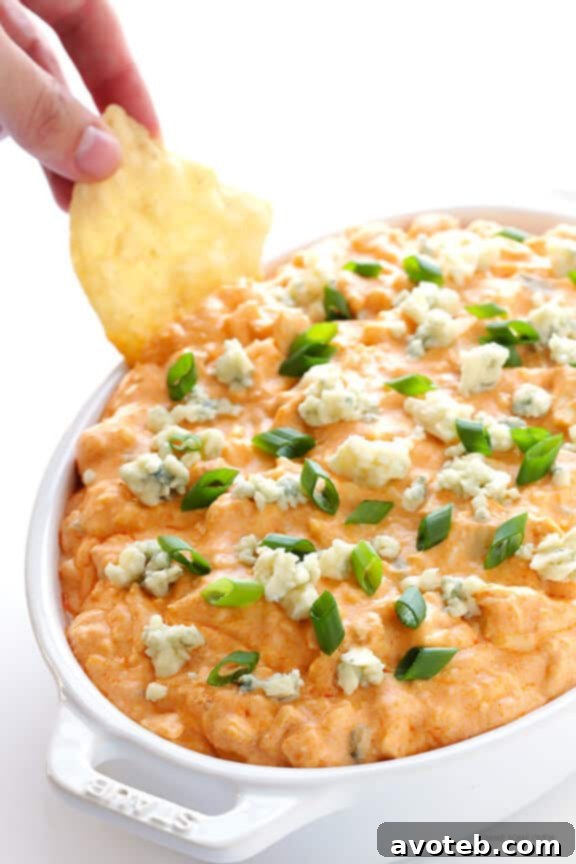 Ultimate Buffalo Chicken Appetizer 7 Slow Cooker Buffalo Chicken Dip ready to be served.