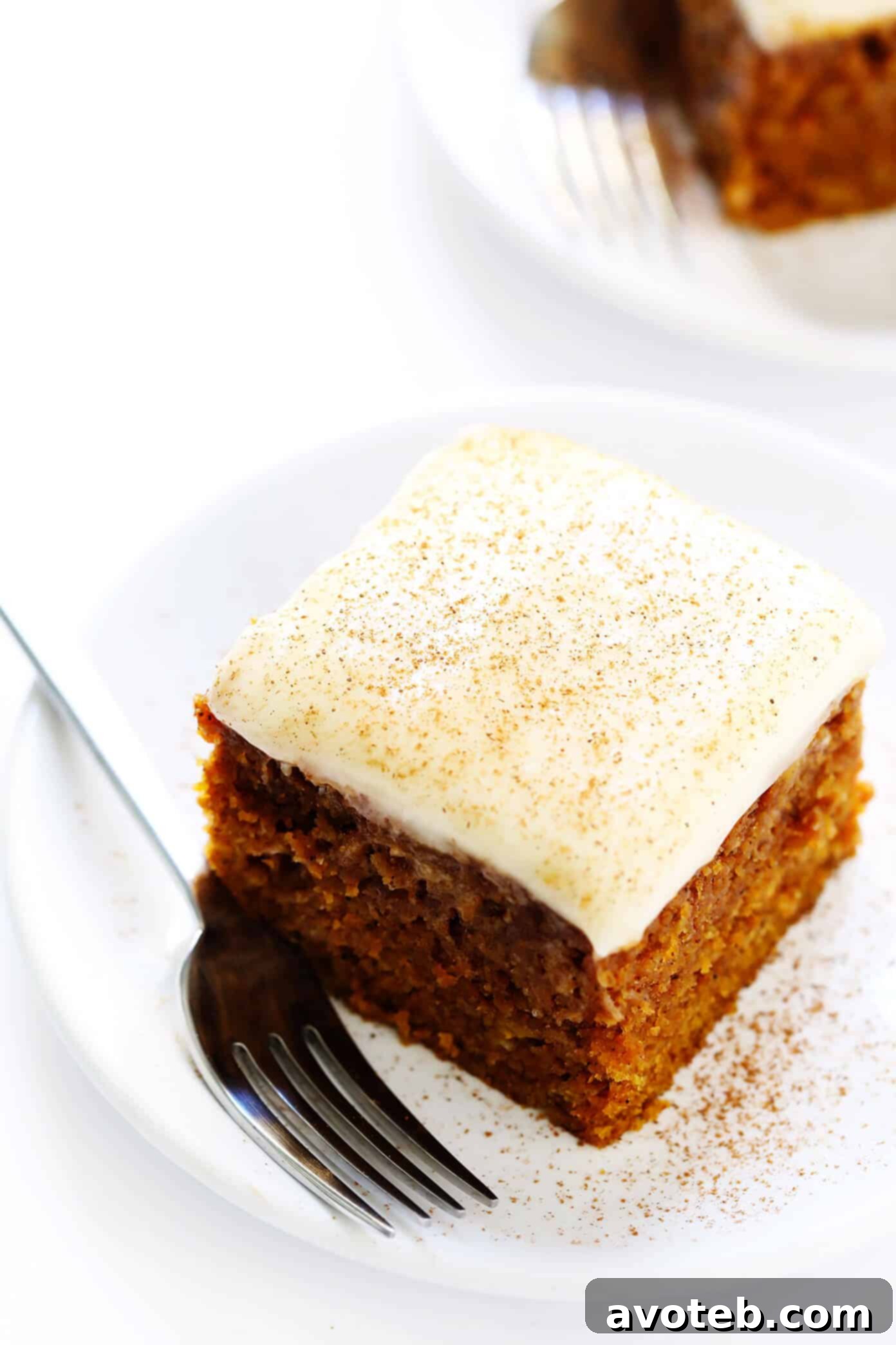 The BEST pumpkin bars recipe! They are nice and moist, made with the perfect amount of pumpkin spice, and topped with the most heavenly cream cheese frosting. The perfect fall or Thanksgiving dessert! | gimmesomeoven.com #pumpkin #bars #dessert #creamcheese #frosting #thanksgiving #fall #baking #cake Moist Pumpkin Bars with Cream Cheese Frosting
