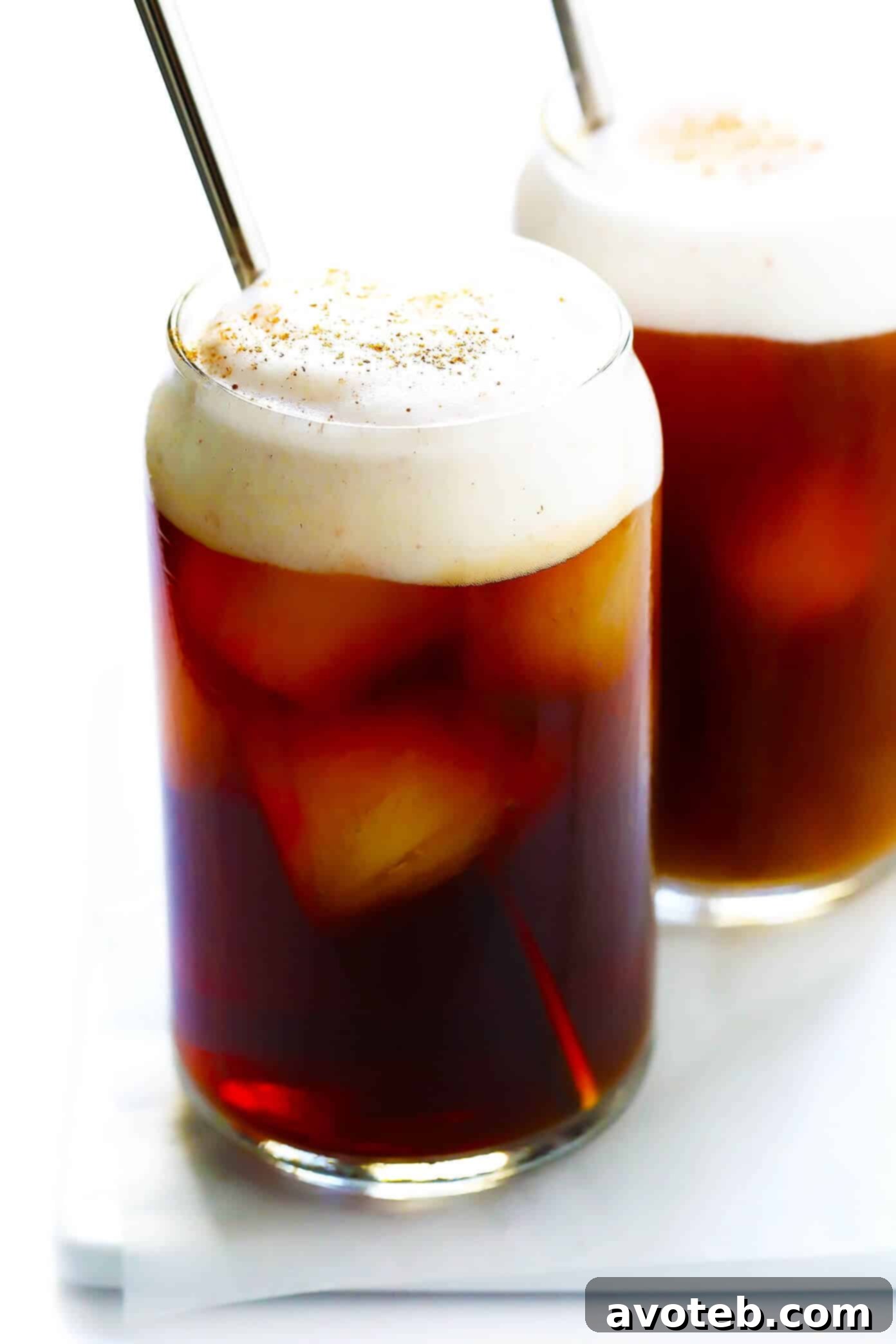 This DIY Pumpkin Cream Cold Brew recipe is inspired by the new Starbucks drink and topped with the yummiest pumpkin foam! Feel free to use your favorite kind of iced coffee, plus whichever type of milk and sweetener you prefer. | gimmesomeoven.com #pumpkin #coldbrew #coffee #breakfast #healthy #drink Homemade Pumpkin Cream Cold Brew Coffee