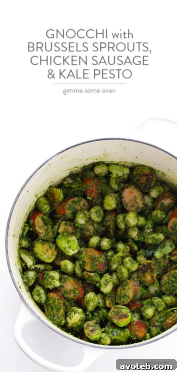 A vibrant bowl of Gnocchi with Brussels Sprouts, Chicken Sausage, and Kale Pesto, ready to be enjoyed