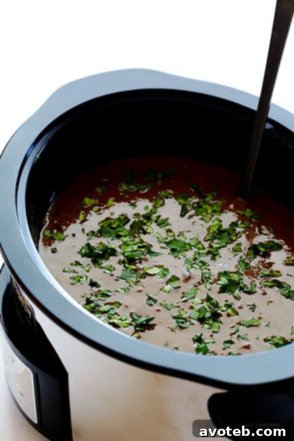 Three ways to enjoy Slow Cooker Black Bean Soup: chunky, smooth, or half-pureed for a creamy texture.