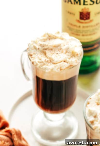 Irish Coffee with whipped cream and chocolate shavings.