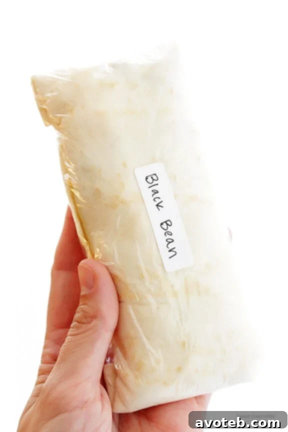 Meal Prep Breakfast Burritos 3 Batch of delicious Freezer Breakfast Burritos ready for storage, showcasing their convenience and versatility.