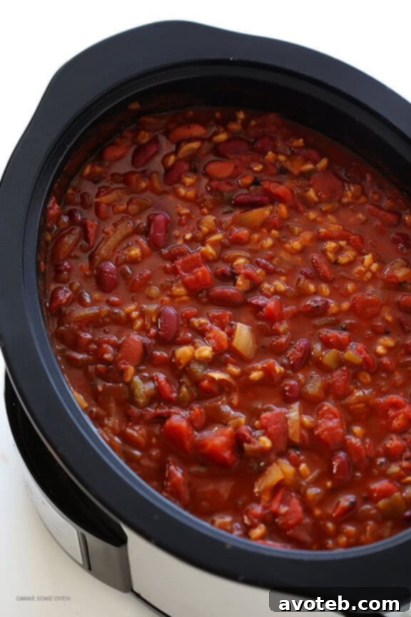 Slow Cooker Vegetarian Chili Recipe -- easy to make in the crock pot or on the stovetop, naturally gluten-free and vegan, and SO delicious! | gimmesomeoven.com