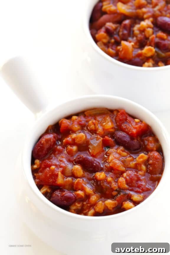 Slow Cooker Vegetarian Chili Recipe -- easy to make in the crock pot or on the stovetop, naturally gluten-free and vegan, and SO delicious! | gimmesomeoven.com