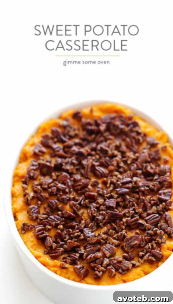 Healthier Sweet Potato Casserole -- naturally sweetened with a hint of maple syrup, and topped with cinnamon pecans